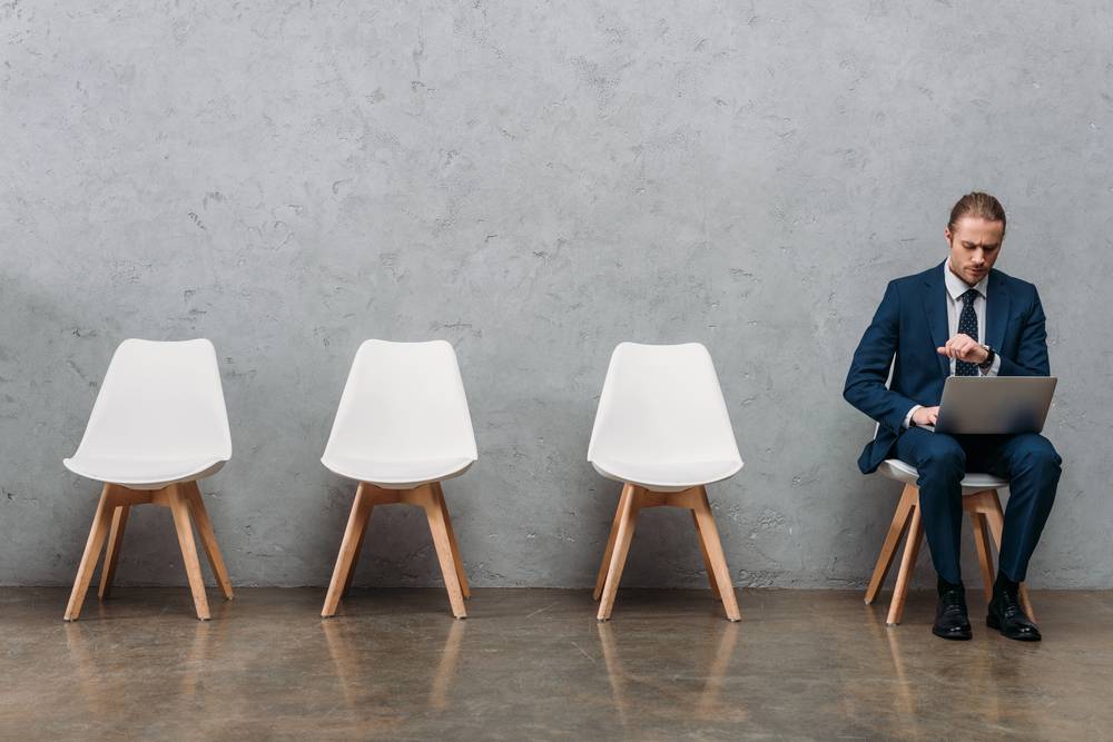 ASR concrete man sitting in chair